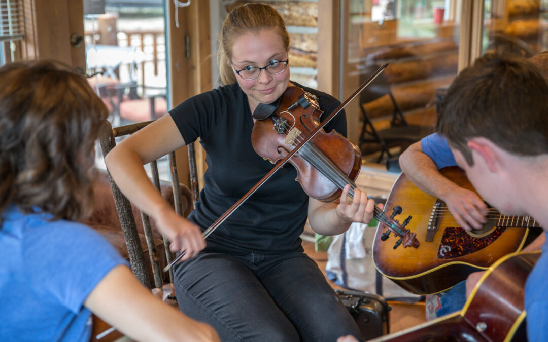 Celeste Johnson plays a fiddle tune with Katie Glassman on guitar in a Texas-style jam session.